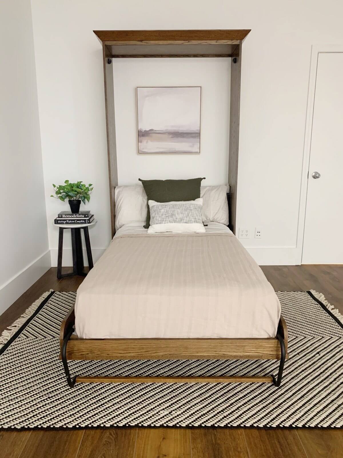 Use your Guest Room as a Gym, Office, or Library by Hiding a Create-A-Bed Murphy Bed in the Wall