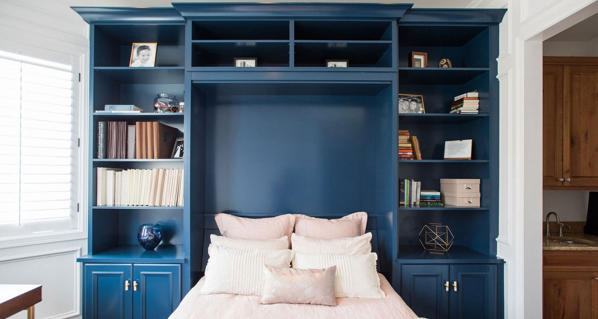Murphy bed in a styled blue office